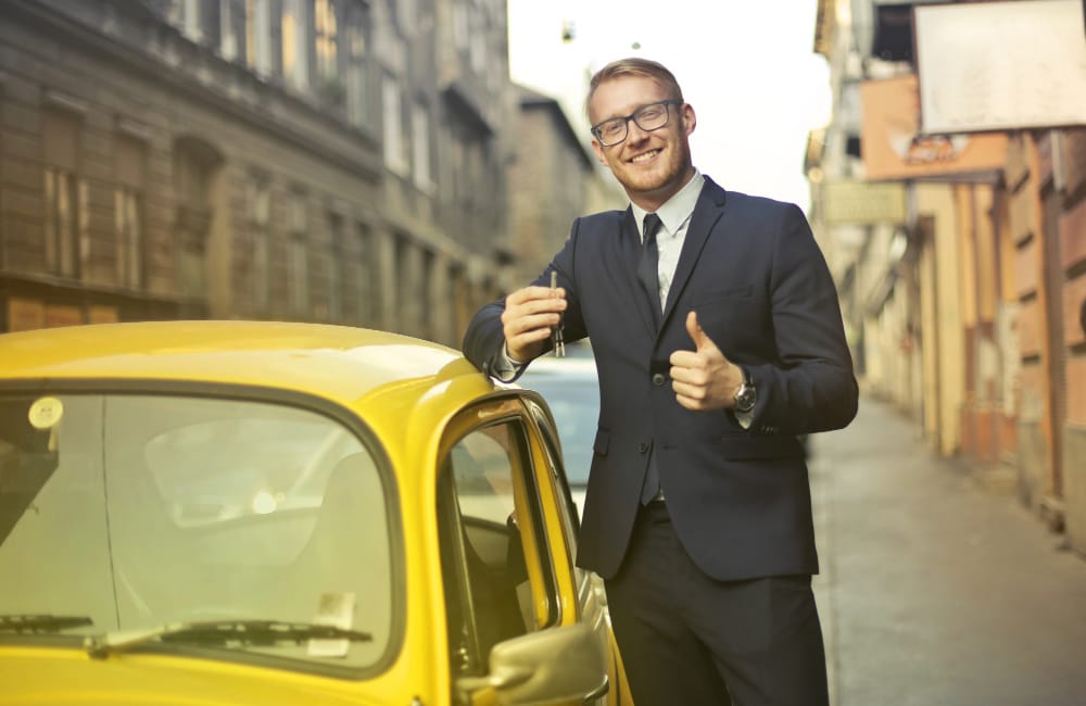 Business man with cute car