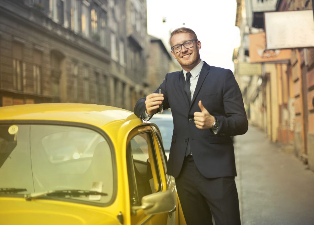 Business man with cute car