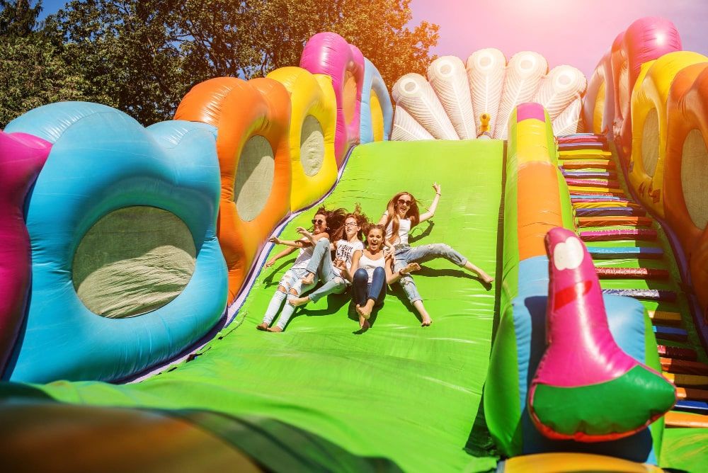 Girls having fun sliding